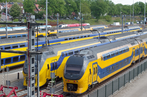 Trains parked at central station Arnhem, Netherlands photo