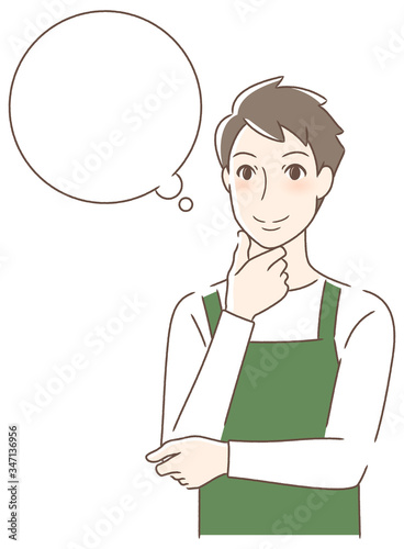 笑顔で想像する男性