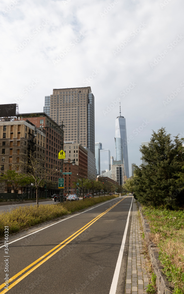 New York, USA, May 2020, Cycle path alongside the Hudson River, The Hudson River Park heading towards Freedom Tower during the Coronavirus lockdown.