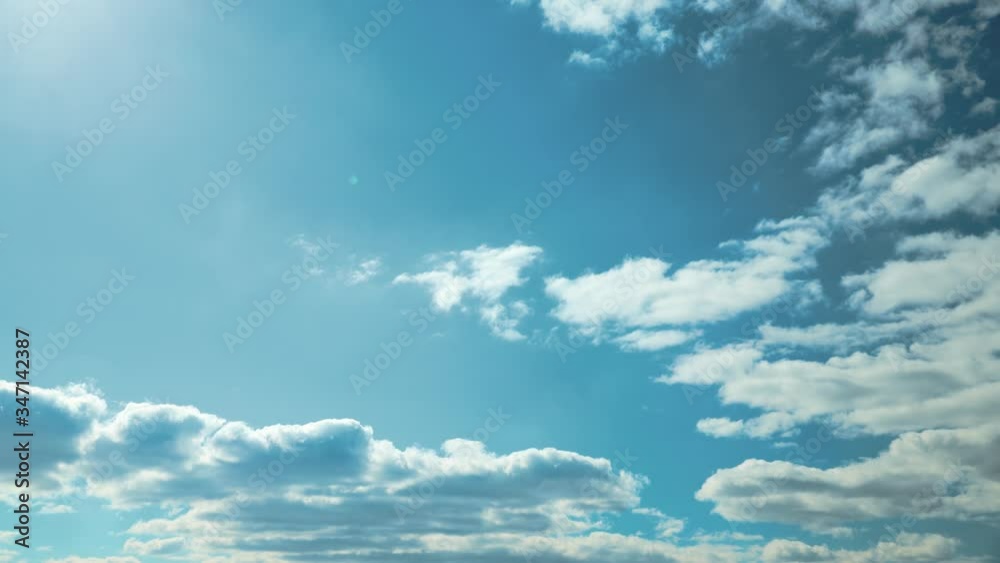 Cloudy Sky With Fluffy Clouds. Natural Background Cloudy Sky With Fluffy Clouds. Natural Background