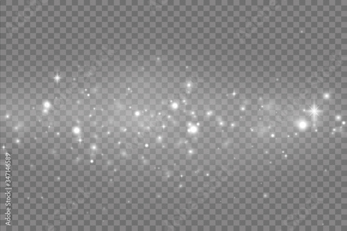 The dust sparks and golden stars shine with special light. Vector sparkles on a transparent background