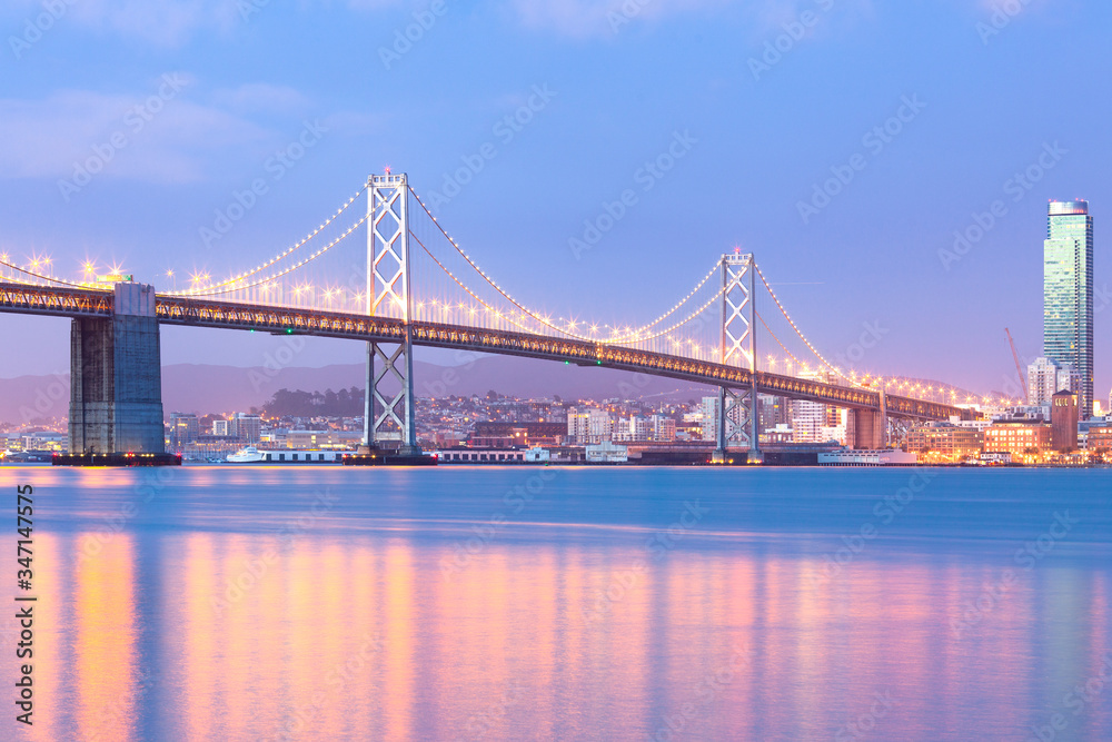 An illuminated view san francisco–oakland bay bridge at dawn, San Francisco, California, United States