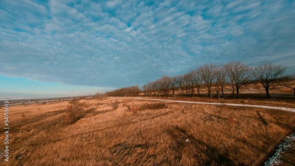 Fpv dron flying over autumn field Fpv dron flying over autumn field