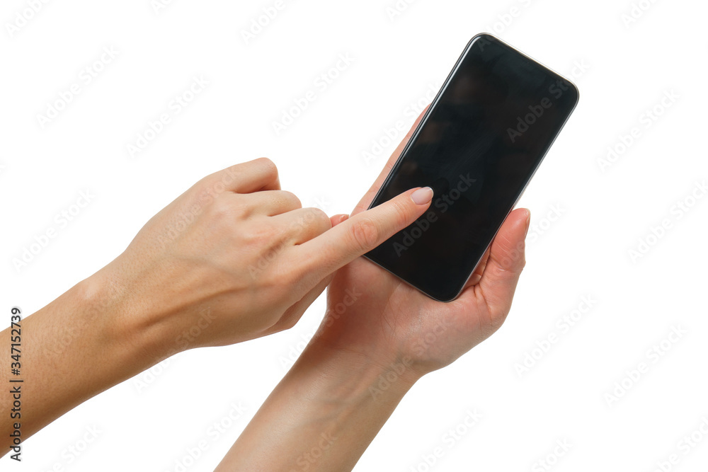 Girl holds in hands a modern smartphone in black on a white background Girl holds in hands a modern smartphone in black on a white background