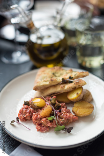 Beef Tartare with Egg Yolk, Fish Roe and Fried Potatoes © cristanna