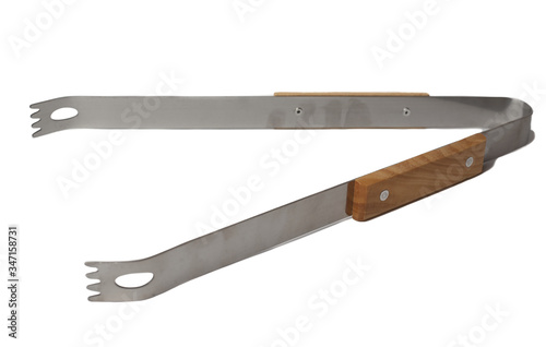 Barbecue tongs isolated on white. Steel, stainless grill tongs with wooden handle.
