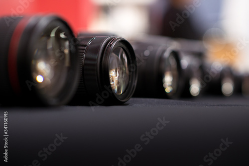 Dslr camera lenses in a row