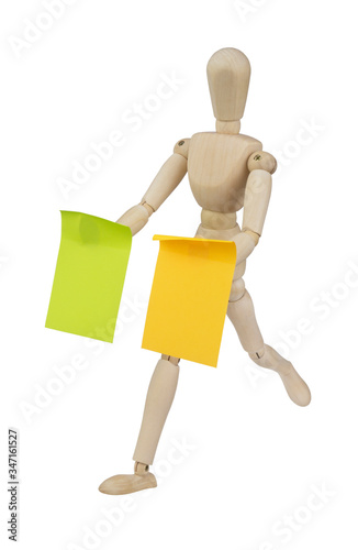 Wooden mannequin with blank note paper stickers isolated on white background