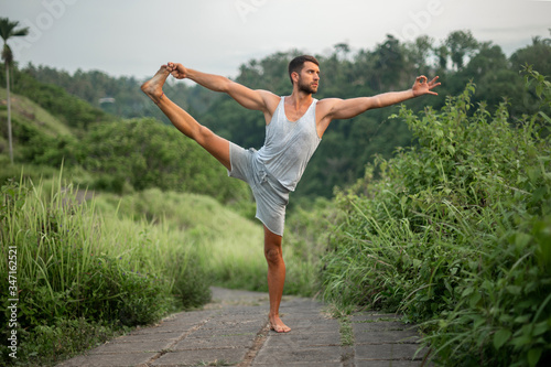 Man practice Yoga practice and meditation outdoor