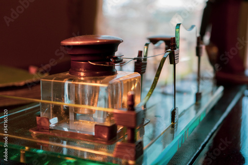 Flasks and ancient scientific objects in a laboratory.