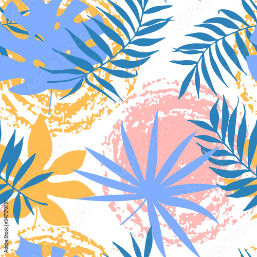 Seamless pattern with abstract hand drawn paint spots and tropical leaves. Botanical silhouette template on a modern colorful geometrical background. Vector illustration.