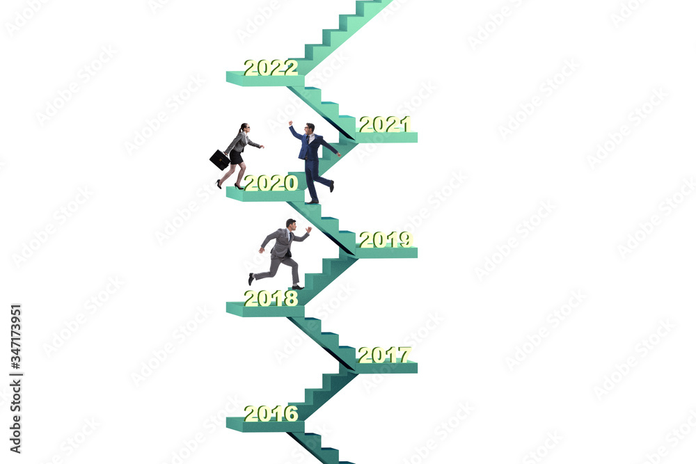 Businessman climbing stairs on yearly basis Businessman climbing stairs on yearly basis