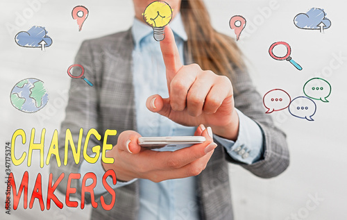 Writing note showing Changemakers. Business concept for Young Turk Influencers Acitivists Urbanization Fashion Gen X photo