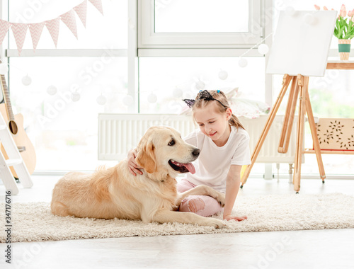 Cute little girl with lovely dog