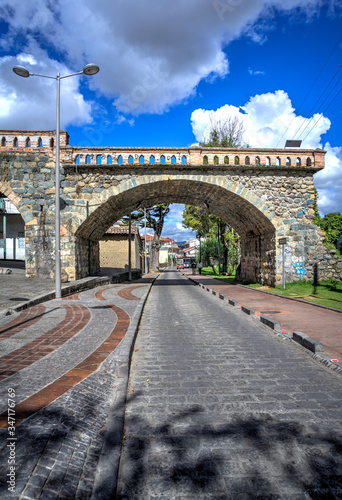 One of the arches of the Puente Roto or Broken Bridge in Cuenca, destroyed by a flood and partially restored as a tourist site, Cuenca, Ecuador, South America. 