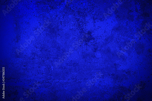 Dark blue rusted metal plate texture background.
