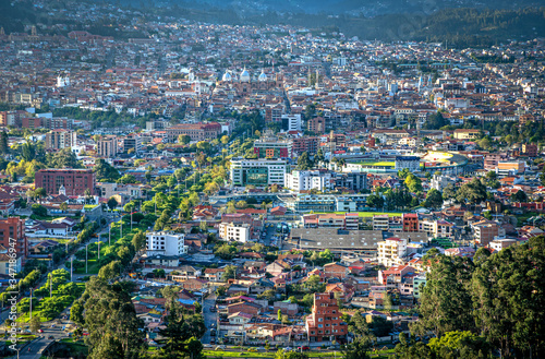 View of the city of Cuenca from the Mirador del Turi lookout, just minutes before sunset. Cuenca, Azuay Province, Ecuador, South America.