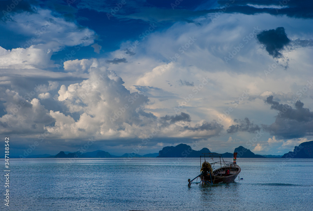Traditional thai boats at sunset beach. Ko Ngai, Krabi province