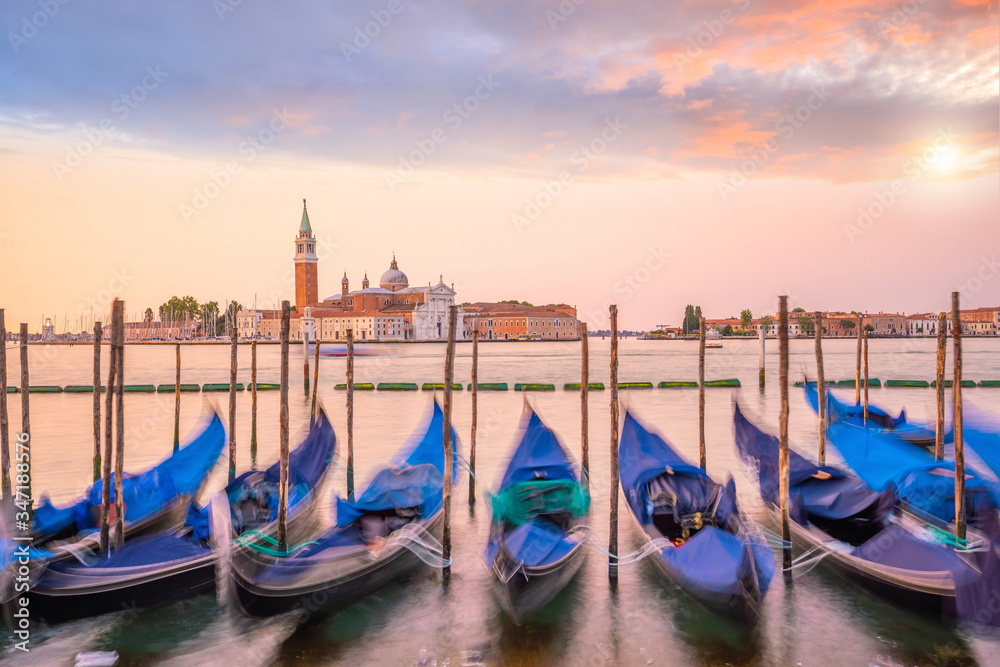 Cityscape image of Venice, Italy during sunrise.