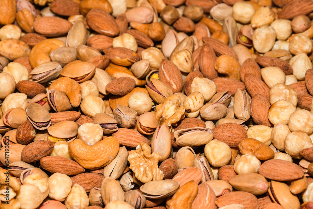 Nuts for sale at the market. Healthy eating concept. Salty snack Nuts for sale at the market. Healthy eating concept. Salty snack