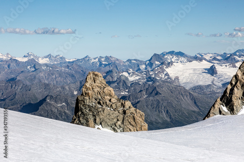 Rocks and stones of Mont-blanc massif view from Mont Maudit in the French Alps, Chamonix-Mont-Blanc, France. Scenic image of hiking concept