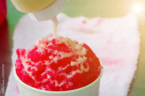 Shaved ice that is wearing milk, popular to eat in summer help photo