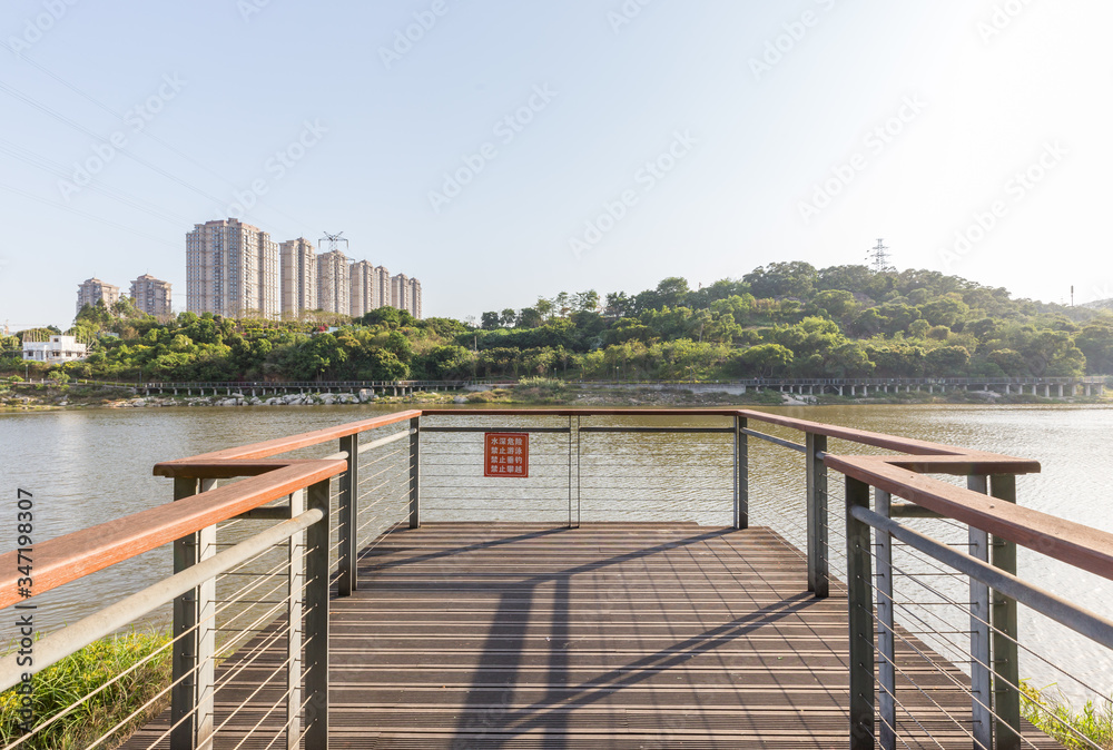Landscape of urban reservoir Park and modern buildings in Xiamen city in China