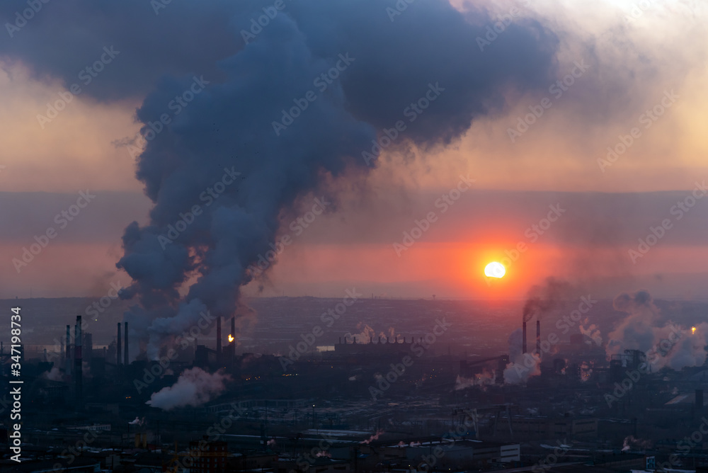Plant with pipes and smoke. Panorama of ndustrial complex. Emissions of air pollutants. Smoke from a factory