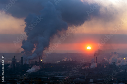 Plant with pipes and smoke. Panorama of ndustrial complex. Emissions of air pollutants. Smoke from a factory