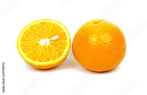 Orange fruit with orange slice isolated on white background
