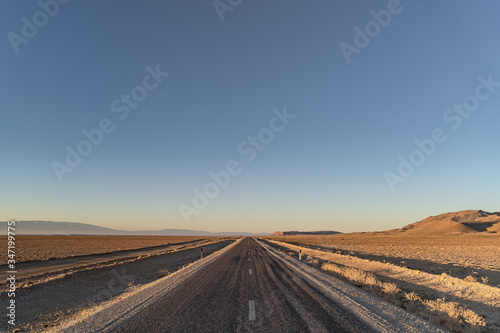 road at dawn in the Sahara desert in North Africa