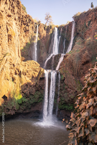 waterfall in the mountains of North Africa in the setting sun