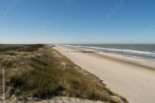 Fototapeta Naklejka Na Ścianę i Meble -  Sand dunes near to the sea with blue sky