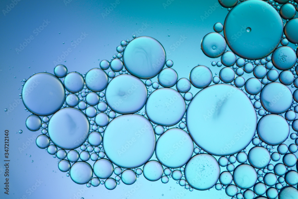 Colorful artistic of oil drop floating on the water. Abstract bubble background. Colorful artistic of oil drop floating on the water. Abstract bubble background.