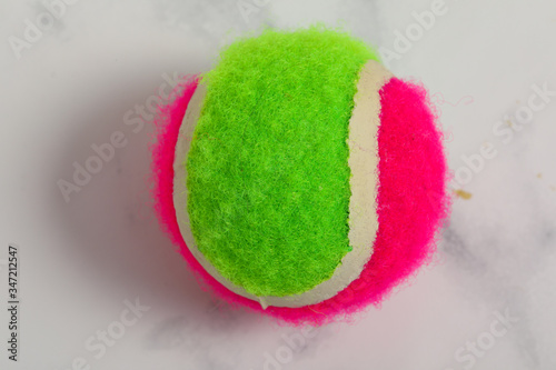 Wallpaper Mural green pink red tennis ball on marble background Torontodigital.ca