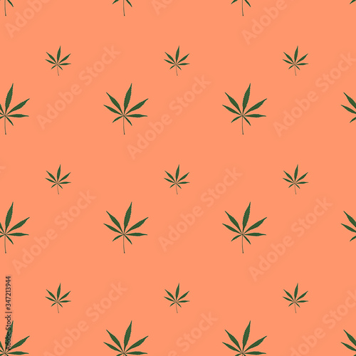 Green cannabis leaves seamless background. Marijuana pattern on light orange background