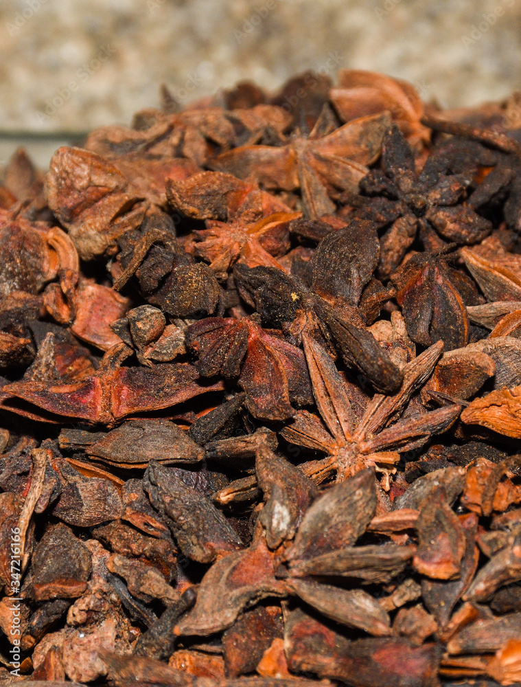 Macro shot of Badyan star anise spice at the market in India Macro shot of Badyan star anise spice at the market in India