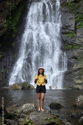 Women enjoying nature at Klong Lan waterfall in Klong Lan national park at Kamphaeng Phet  Thailand 