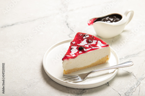 Cheesecake with jam on the table