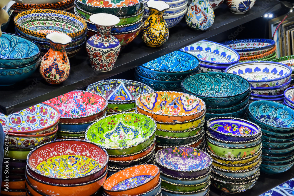Collection of turkish ceramics on sale at the Grand Bazaar in Istanbul, Turkey. Turkish colorful ornamental ceramic souvenir plates