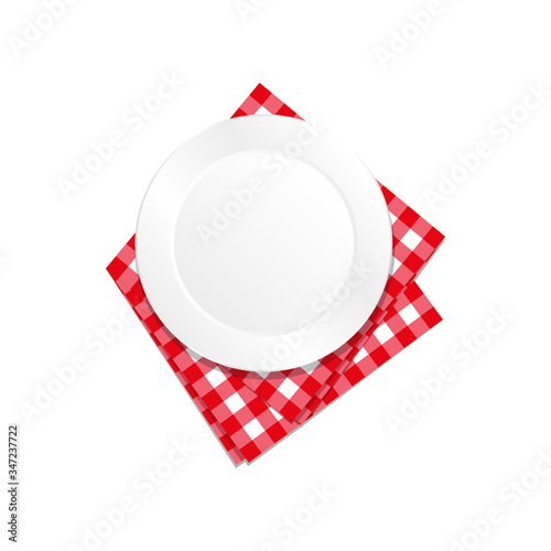 White plate on
checkered tablecloth vector