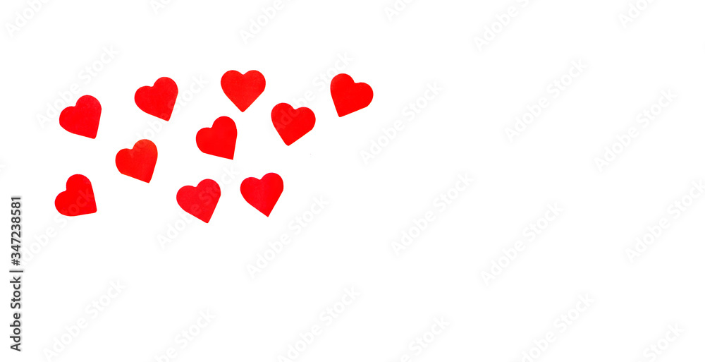 Bright red hearts made of paper . Valentine's day postcard concept. Horizontal photo with place for text. White background