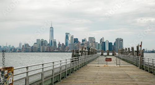Pier at the Statue of Liberty with Manhattan in the background © Andrs