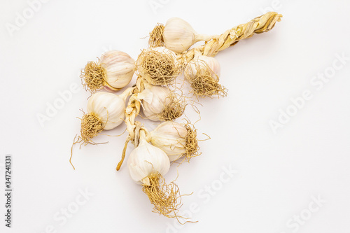 Ripe garlic heads isolated on white background