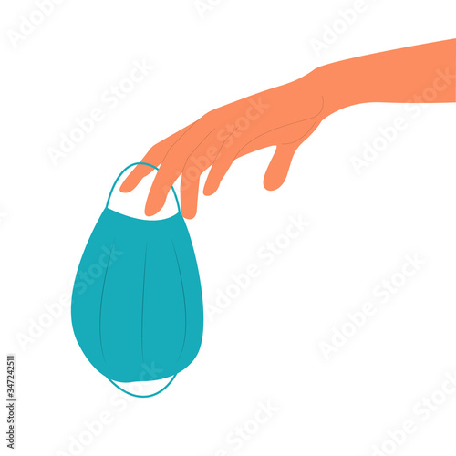 Vector illustration a hand gracefully holds a medical mask. Virus protection.