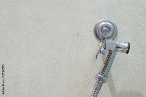 Handheld Bidet Sprayer metallic gray, for hygiene and cleaning