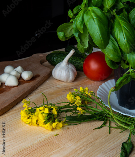 
Green cucumber and Vegetables for making pizza. Ready free space for text.