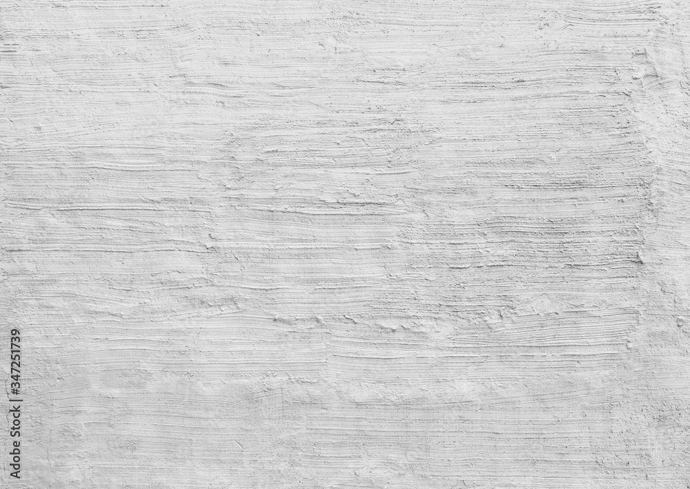 Plastered and rough concrete or stone wall painted in white or light gray, hand made stucco texture. High resolution full frame textured background in black and white. Copy space. Plastered and rough concrete or stone wall painted in white or light gray, hand made stucco texture. High resolution full frame textured background in black and white. Copy space.