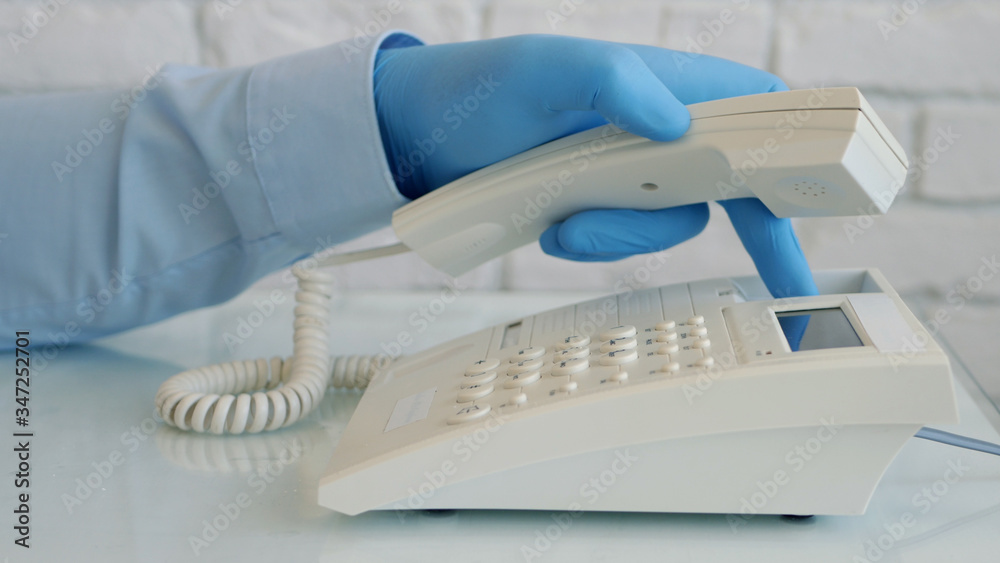 Man Wearing Protection Gloves in Hands Using Telephone Communication, Social Distancing Lifestyle Man Wearing Protection Gloves in Hands Using Telephone Communication, Social Distancing Lifestyle