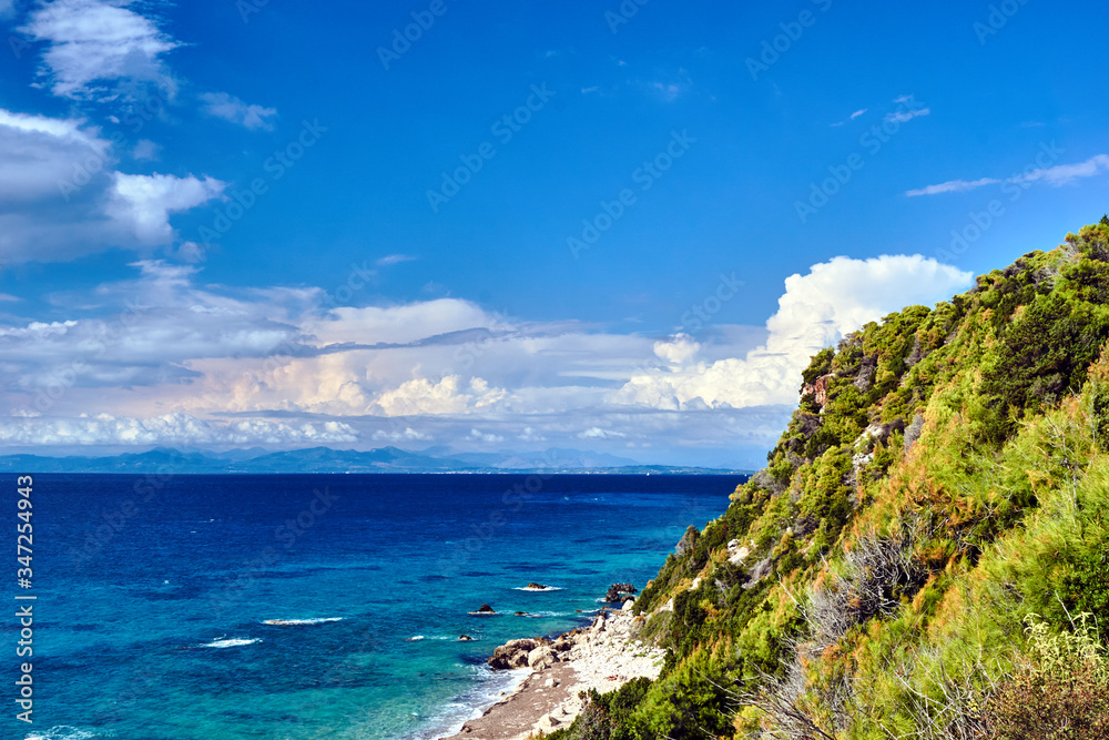 Fototapeta premium stone beach and Rocky cliff on the Greek island of Lefkada.